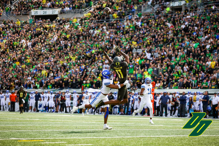 Oregon Ducks wide receiver Troy Franklin hauls in a deep pass during a game against the BYU Cougars.